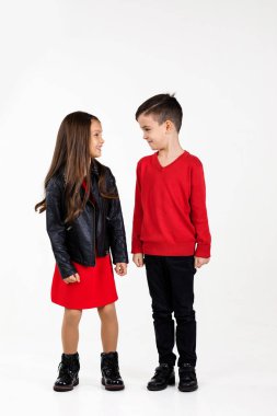 Happy smiling little kids in red outfit