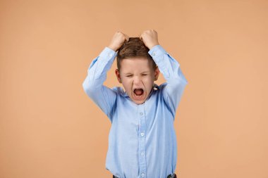 little child boy rips his hair and screams clipart