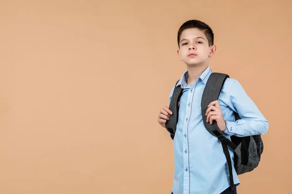 Little cute school boy with gray backpack — 스톡 사진