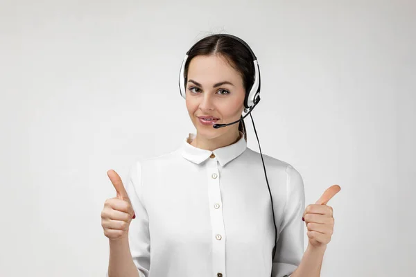 Consultant of call center in headphones — Stock fotografie