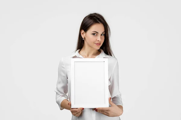 Girl with empty frame for your text — Stock Photo, Image