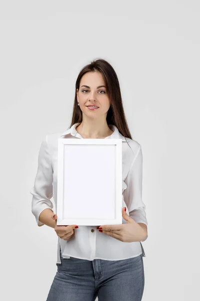 Girl with empty frame for your text — Stock Photo, Image