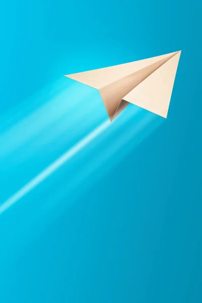 Paper airplane on blue background — Stock Photo, Image