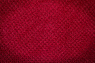 Geçmişi. Doku. Koyu köşeli yünlü kırmızı kumaş..
