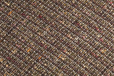 Geçmişi. Doku. Kahverengi tonlarda kumaş..