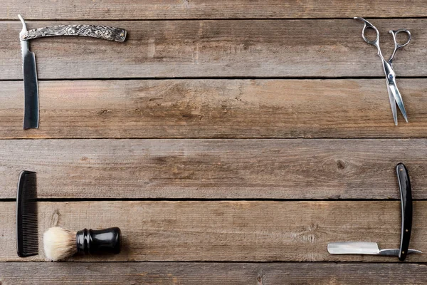 Comb and straight razors — Stock Photo, Image