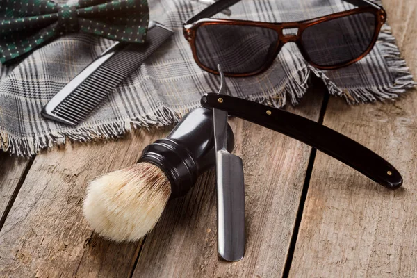 Brush, comb and plaid scarf