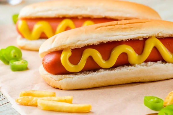 Hot dogs and potatoes — Stock Photo, Image