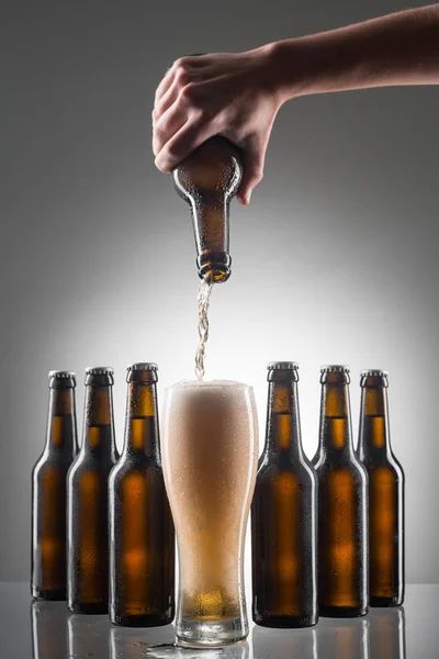 Pouring beer into a glass