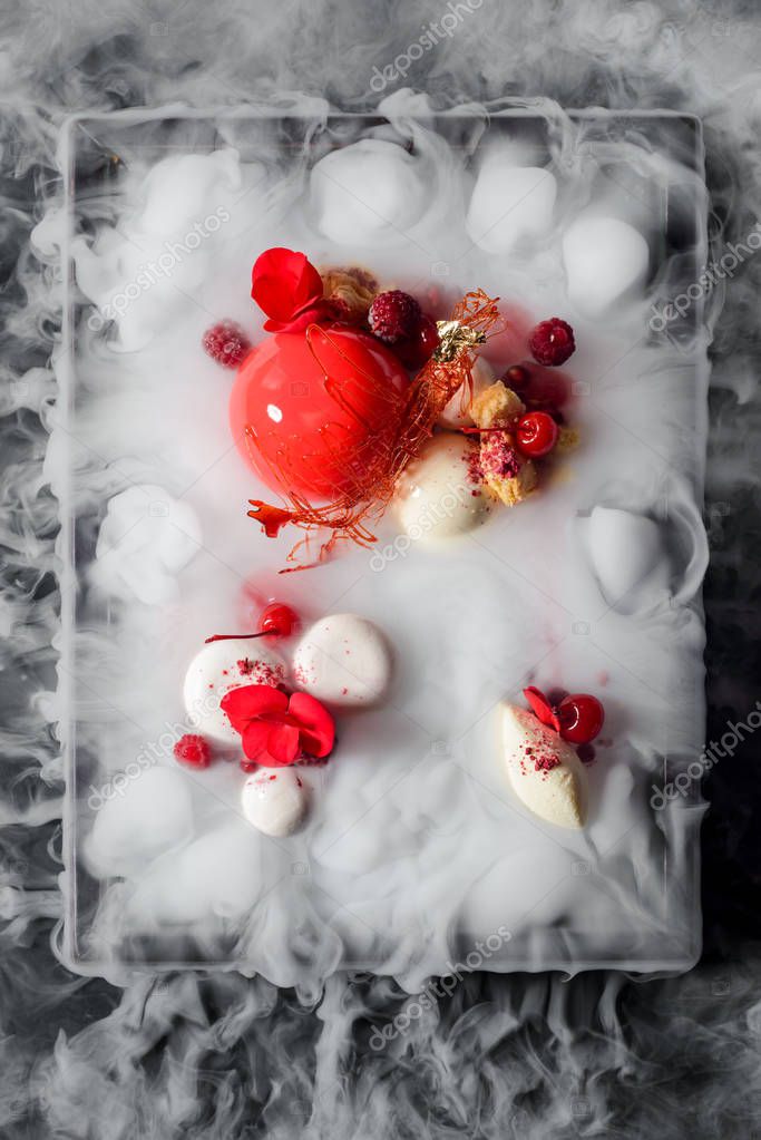 Dessert in dry ice mist — Stock Photo © YGphoto 152051112