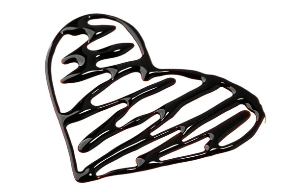 Heart shape painted with chocolate syrup with zig zag pattern — Stock Photo, Image