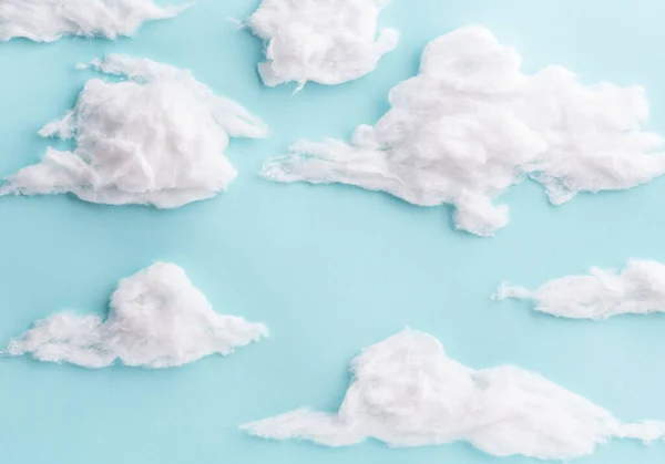 White cotton wool clouds on blue background — Stock Photo, Image