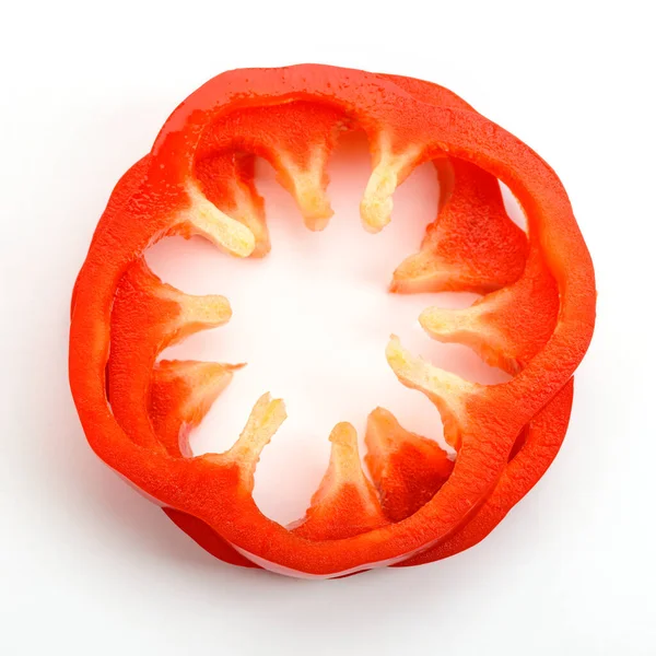 Vista superior em fatias de anel de pimenta vermelha — Fotografia de Stock