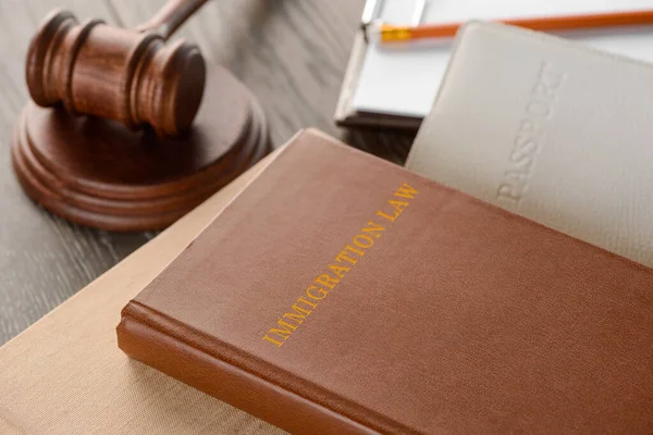 Judges gavel, book and documents on wooden table — Stock Photo, Image