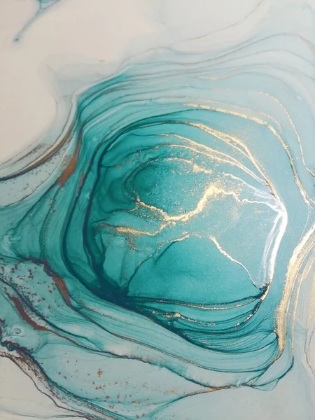 Luxury abstract fluid art painting background alcohol ink technique turquoise and gold. Sparkling marble texture.