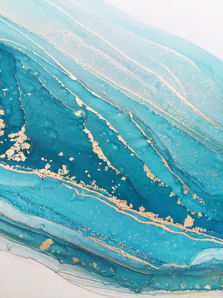Luxury abstract fluid art painting background alcohol ink technique turquoise and gold. Sparkling marble texture.