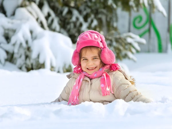 Little child playing in snow — Stock Photo, Image