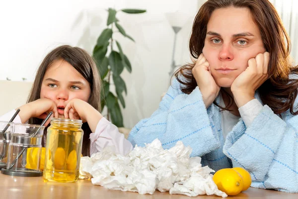 Mother and daughter with cold or flu — Stock Photo, Image