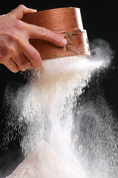 Making dough by female hands at home in kitchen — Stock Photo, Image