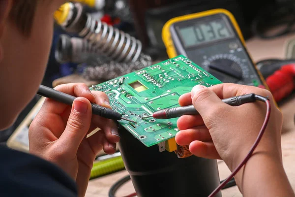 Repair of electronic devices, tin soldering parts — Stock Photo, Image