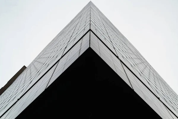 Abstract low angle view of a new york building on a cloudy day