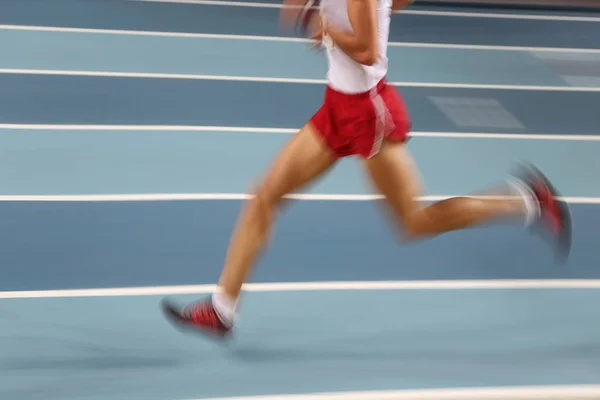 Blured athletes running — Stock Photo, Image