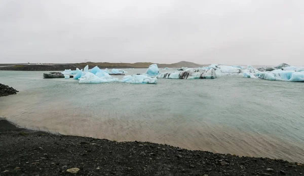 Ledovce v Jokulsarlon ledové říční laguně, Island — Stock fotografie