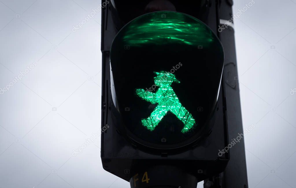 Traffic Light with Green Man Ampelmann Walking, Berlin, Germany