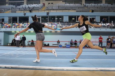 ISTANBUL, TURKEY - FEBRUARY 02, 2020: Athletes running 4x400 relay race during Turkish Indoor Athletics Championships