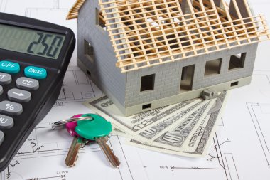Ev inşaat, tuşları, hesap makinesi ve para birimlerinin dolar elektrik çizimler, bina ev kavramı altında