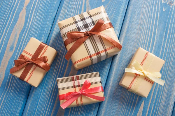 Wrapped colorful gifts with ribbons for Christmas or other celebration — Stock Photo, Image