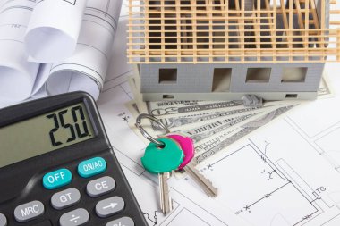 Ev bina ev kavramı altında inşaat, tuşları, hesap makinesi, para birimlerinin dolar ve elektrik çizimler