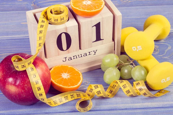 Vintage foto, kub kalender, frukter, hantlar och måttband, nyår resolutioner — Stockfoto