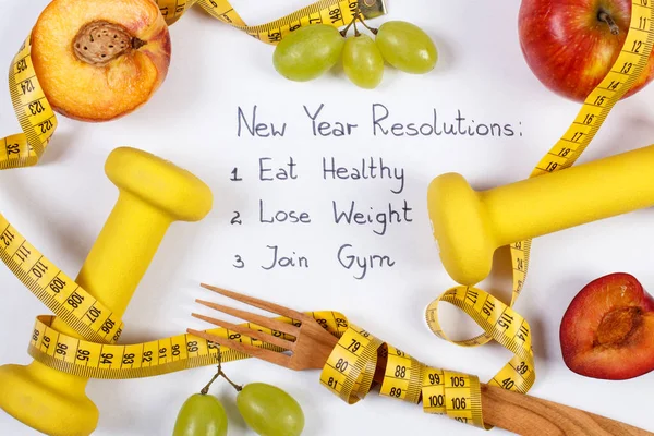 New year resolutions, fruits, dumbbells and centimeter, healthy food and lifestyle — Stock Photo, Image