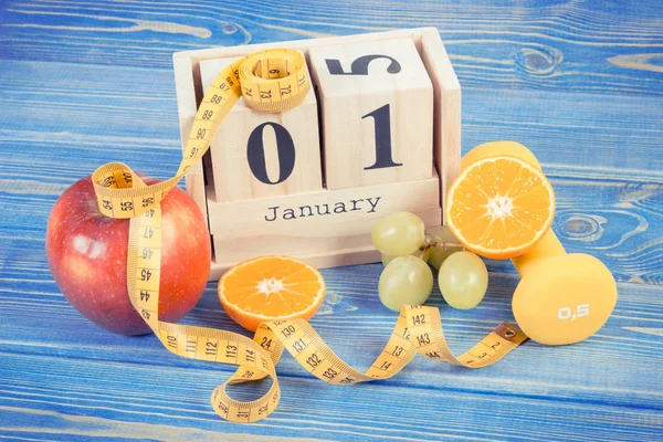 Vintage photo, Cube calendar, fruits, dumbbells and tape measure, new years resolutions — Stock Photo, Image