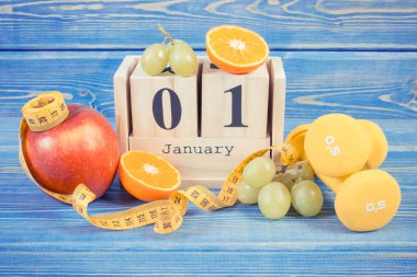 Vintage Fotoğraf, küp takvim, meyve, halter ve şerit metre, yeni yıl kararları
