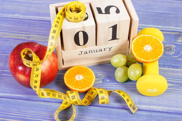 Kostka, kalendarz, owoce, hantle i centymetrem, uchwał Nowy rok — Zdjęcie stockowe