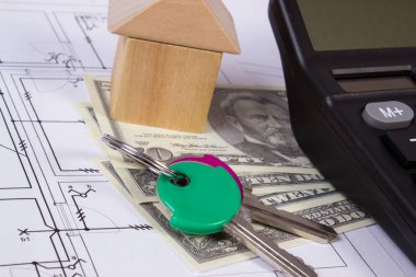Ev ahşap bloklar ve para birimlerinin dolar çizim, ev kavramı bina inşaat hesap makinesiyle
