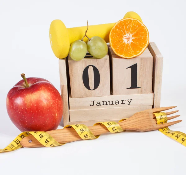 Calendario dei cubi, frutta, manubri e metro a nastro, risoluzioni di Capodanno — Foto Stock