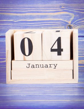 4 Ocak. Tarihi ahşap küp takvim üzerinde 4 Ocak