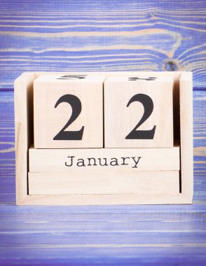 22 Ocak. Ahşap küp takvim üzerinde 22 Ocak tarihi