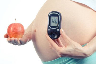 Vintage Fotoğraf, Şeker Ölçüm ve apple, diyabet ve gebelik sırasında sağlıklı beslenme ile hamile kadın