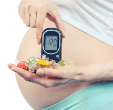 Şeker Ölçüm ve renkli şekerler, diyabet ve gebelik sırasında sağlıklı beslenme ile hamile kadın