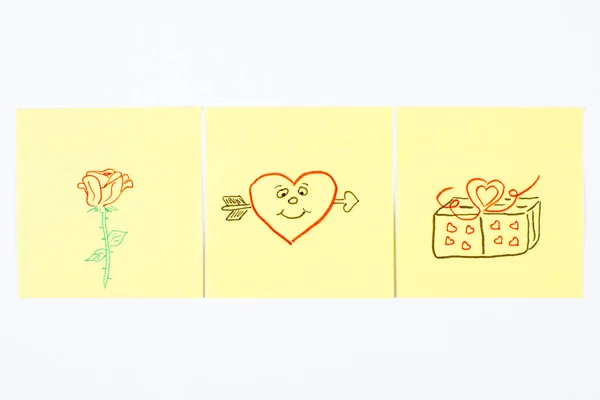 Valentin-napi szimbólumok papírra rajzolva, a szerelem szimbóluma — Stock Fotó