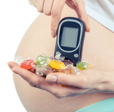 Şeker Ölçüm ve renkli şekerler, diyabet ve gebelik sırasında sağlıklı beslenme ile hamile kadın