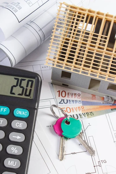 House under construction, keys, calculator, currencies euro and electrical drawings, concept of building home — Stock Photo, Image