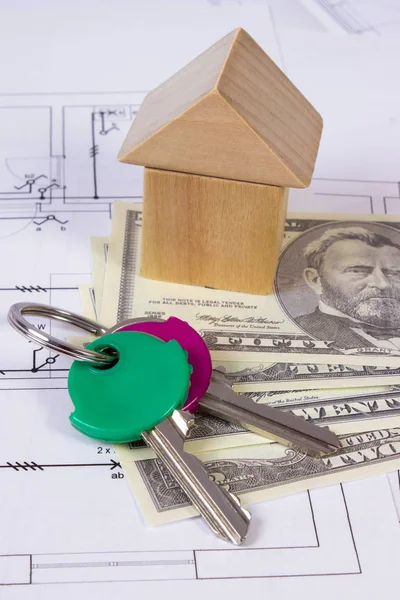 House of wooden blocks, keys and currencies dollar on construction drawing, building house concept — Stock Photo, Image