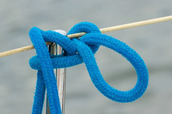 Yachting, blue rope on sailboat, details of yacht, sea background — Stock Photo, Image