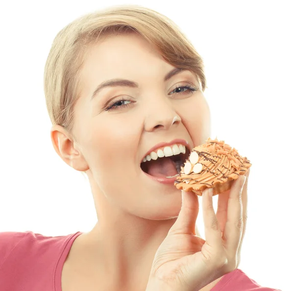 Foto vintage, mulher feliz comendo cupcake fresco, sobremesa deliciosa — Fotografia de Stock