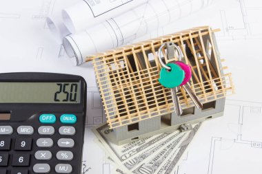 Ev bina ev kavramı altında inşaat, tuşları, hesap makinesi, para birimlerinin dolar ve elektrik çizimler